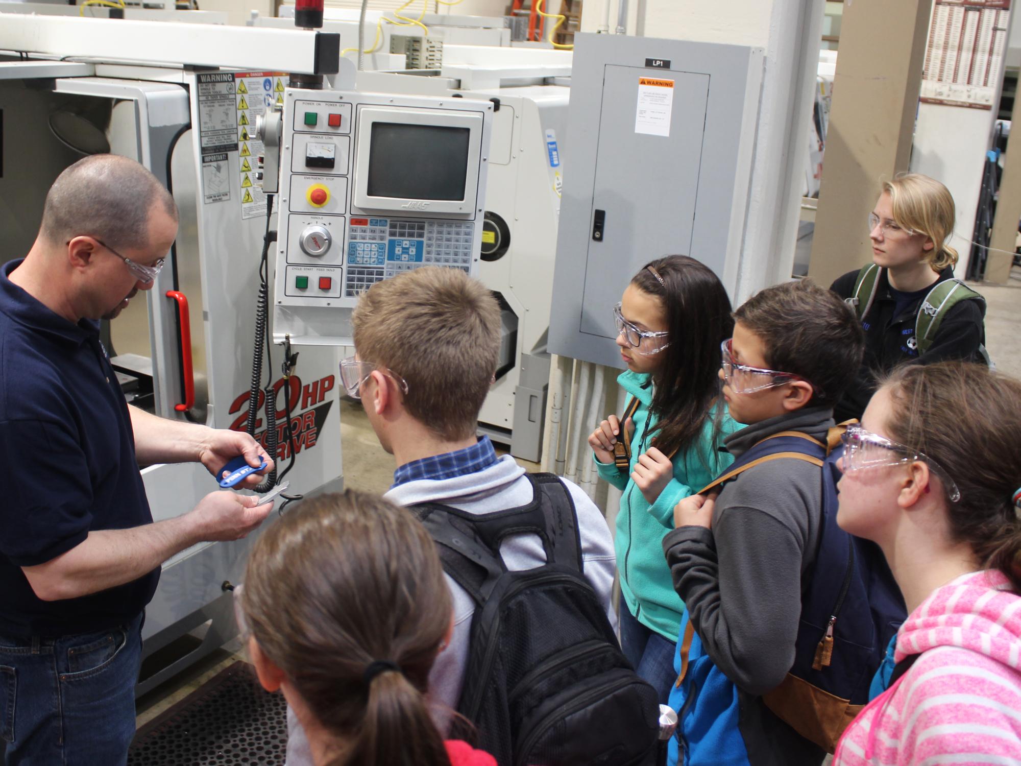 The young students get a look at some of the capabilities of the FAME lab.