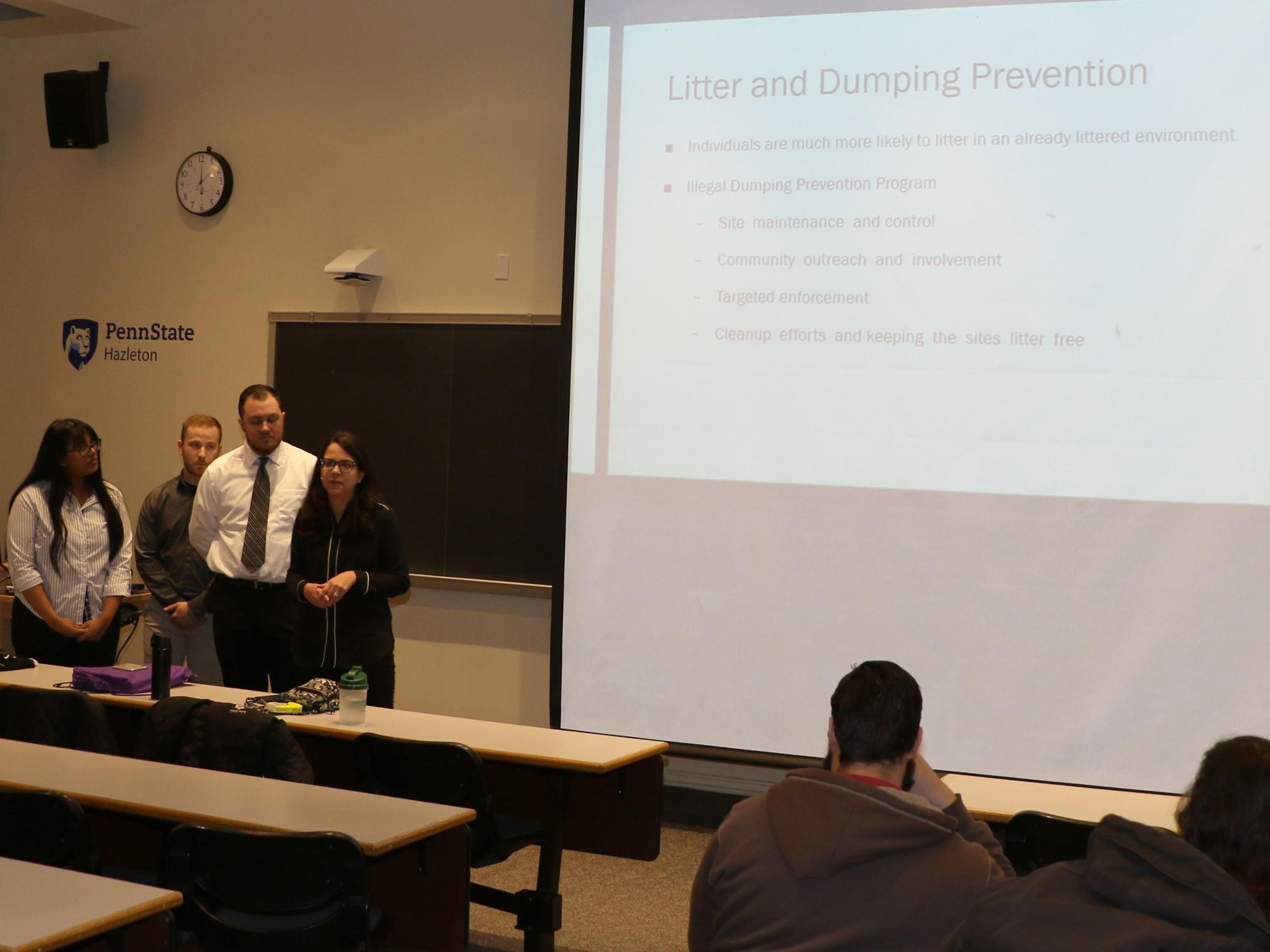 Engineering students, from left, Mari Magabo, David Bonczek, Derek Geake and Raiana Nichols present their research project proposal. 