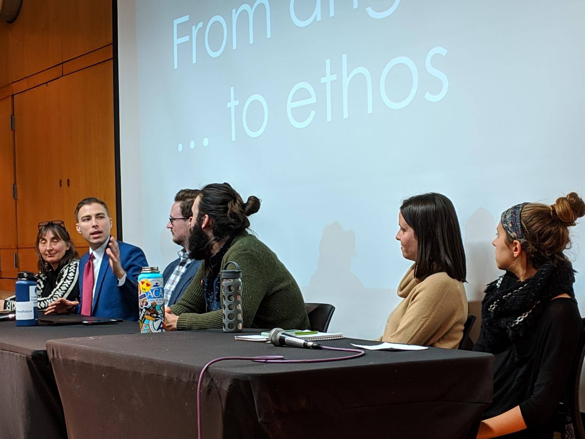 Man talking on a panel