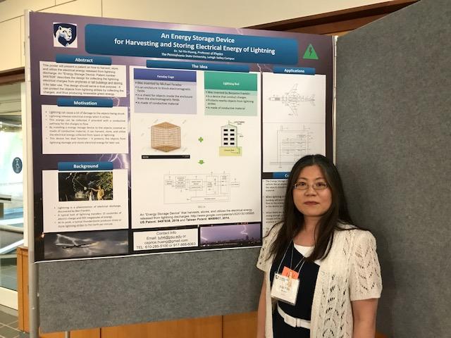 woman in front of a research poster