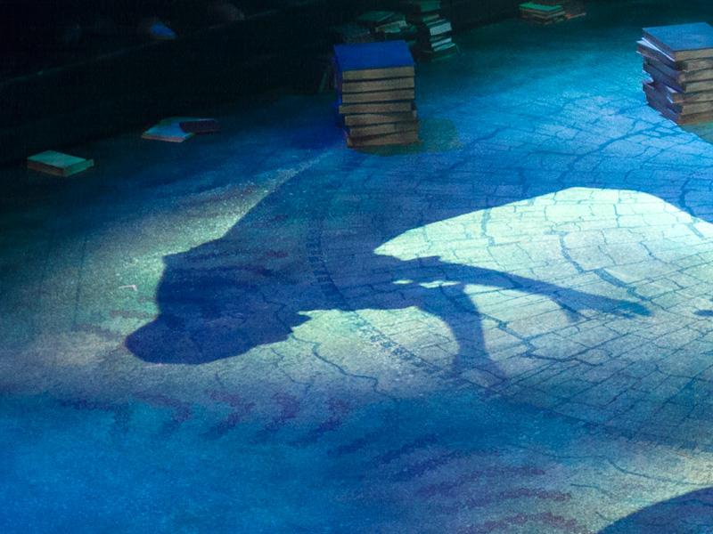 A projection of Little Red on stage during "Into the Woods" 