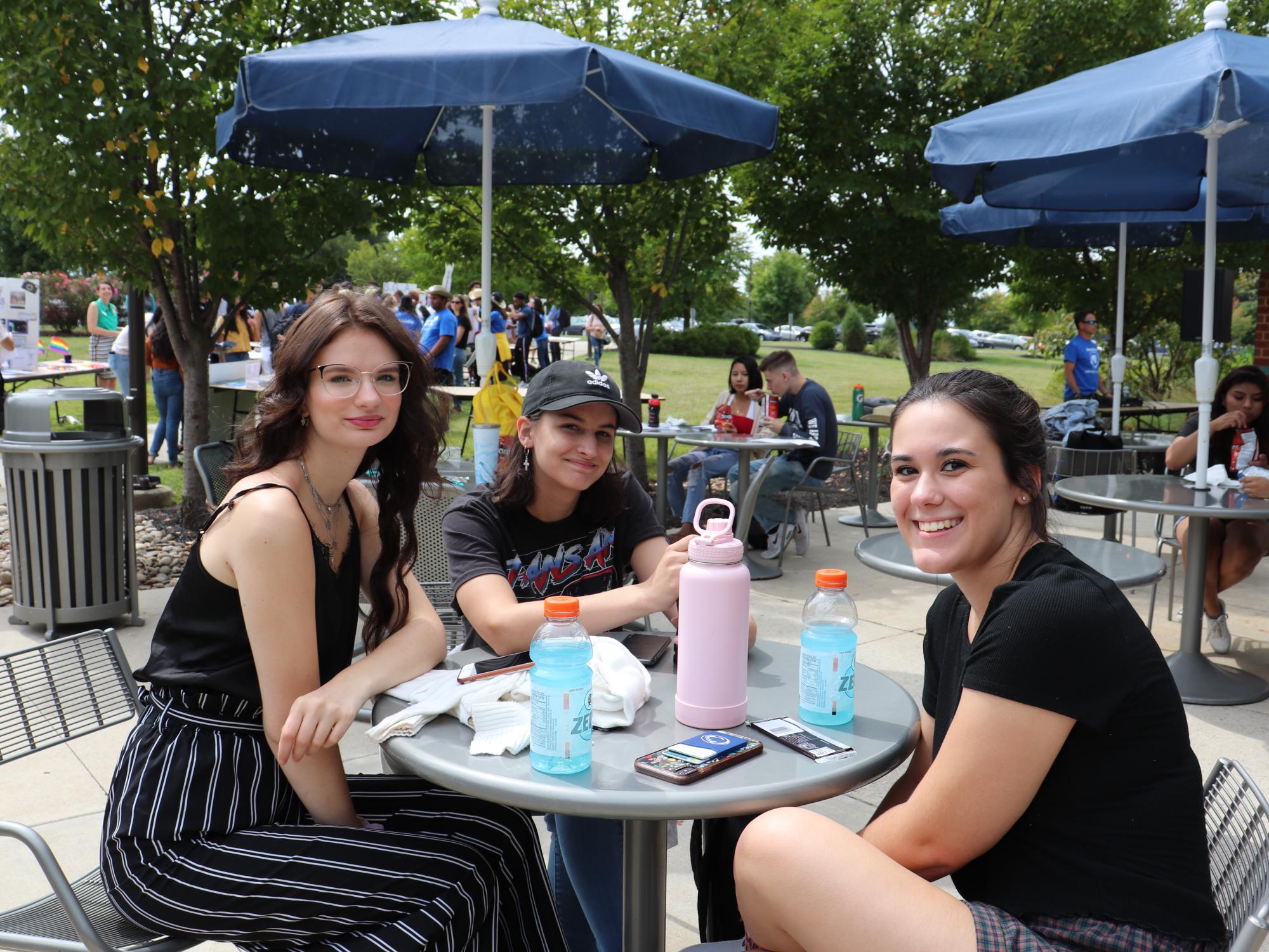 young women sitting at a table