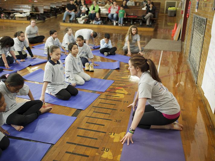 Dr. Jessica Schocker holds a Yoga class at Glenside Elementary School