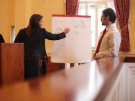 Professor Casey McClain instructs Alaina Dickens on how best to present facts to a jury.