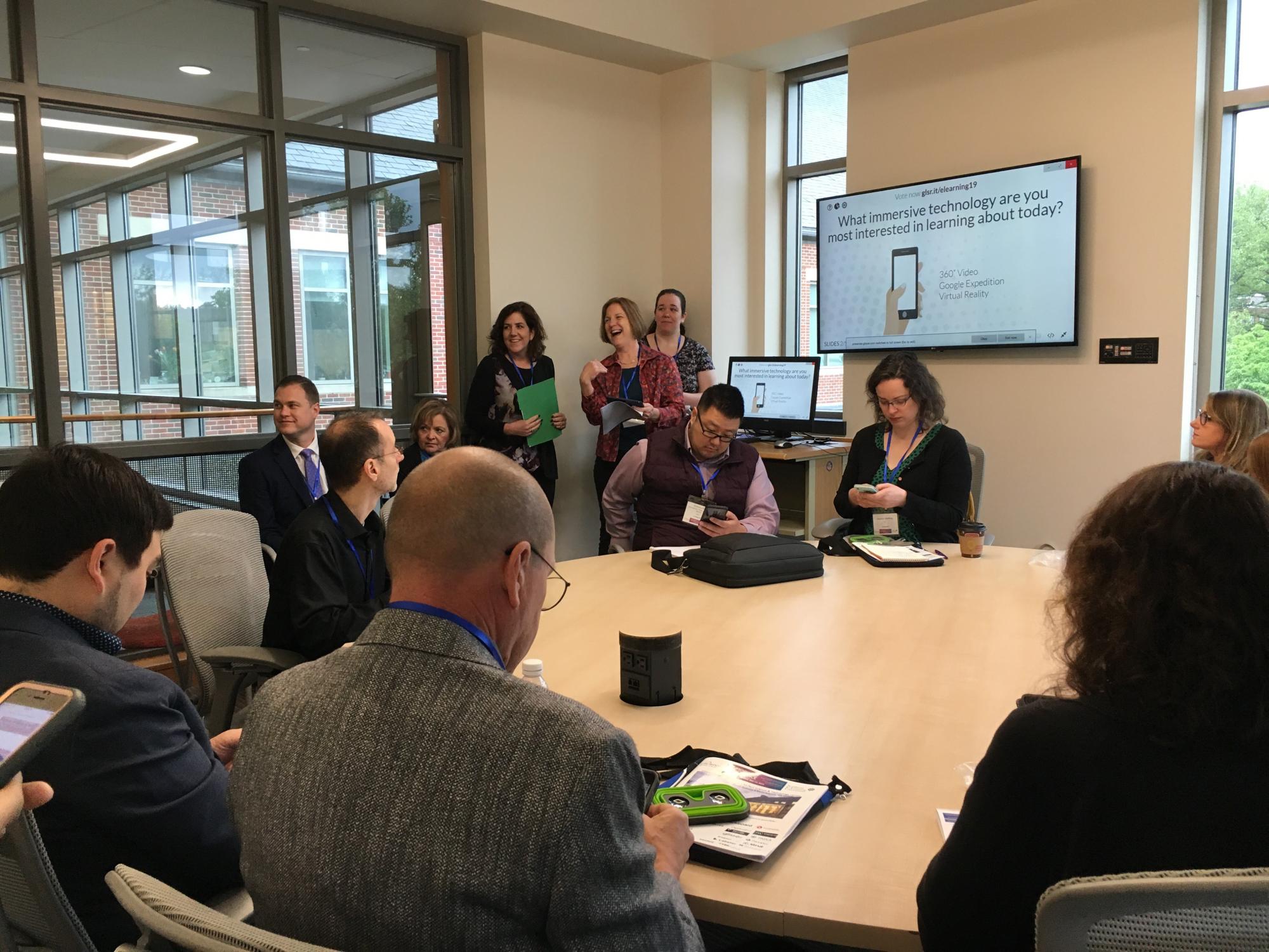 women presenting in a conference room
