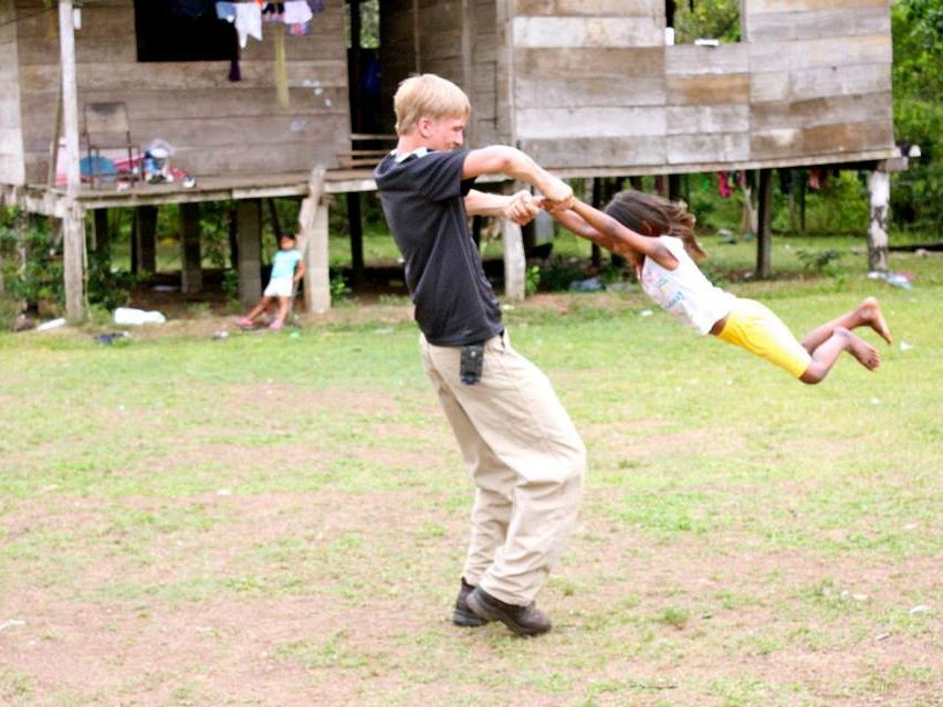 Kyle Johnson spinning a young girl