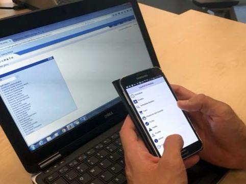 Laptop screen and smart phone showing LionPATH