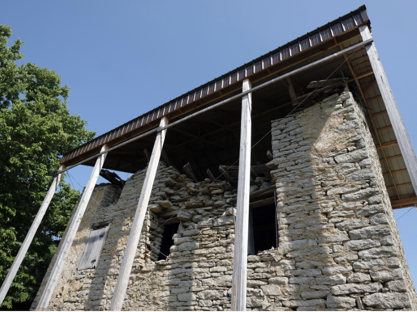 looking up at damage to upper parts of large building