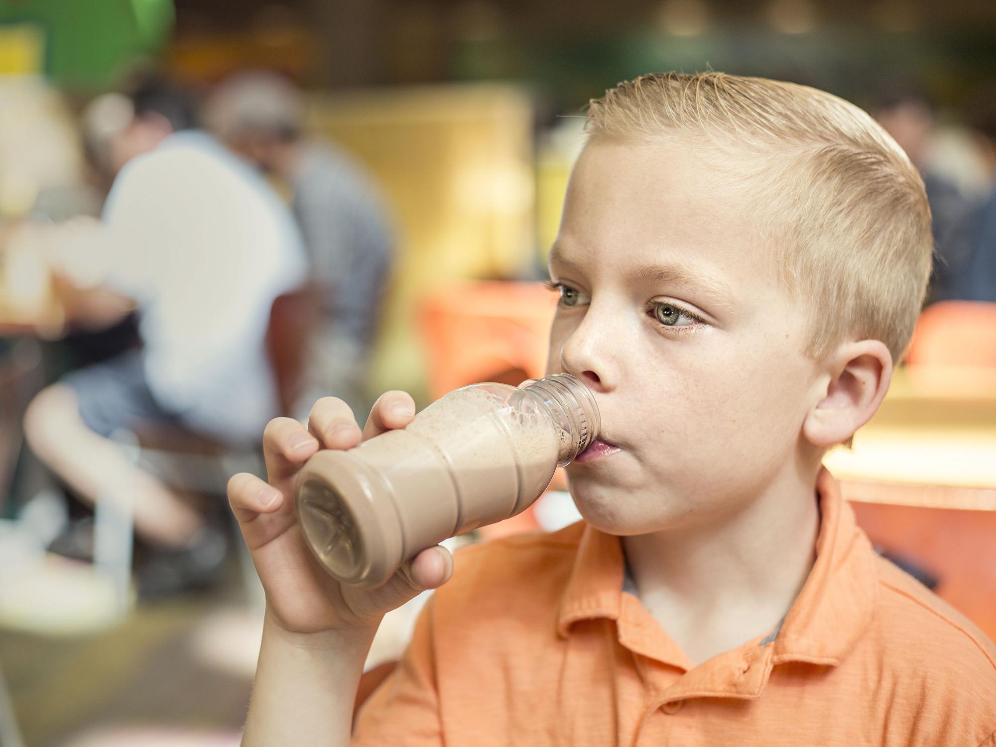 boy drinking chocolate milk