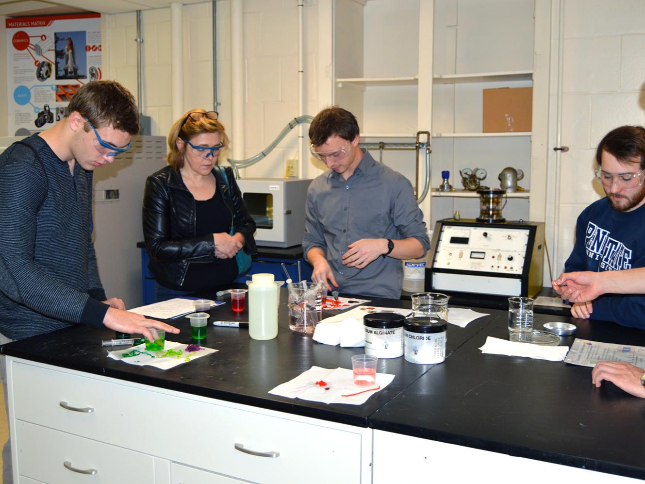 students doing polymer demonstration