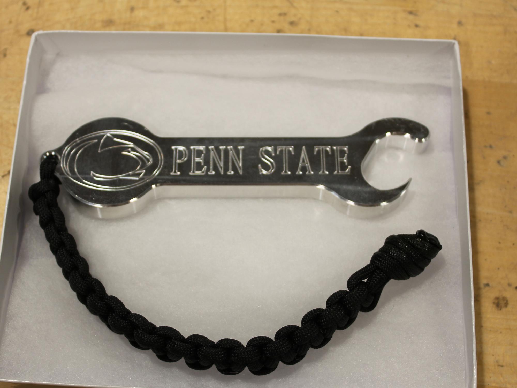 Front side of a bottle opener/wrench made in the Factory for Advanced Manufacturing Education within the Harold and Inge Marcus Department of Industrial and Manufacturing Engineering for Military Appreciation Day donors 