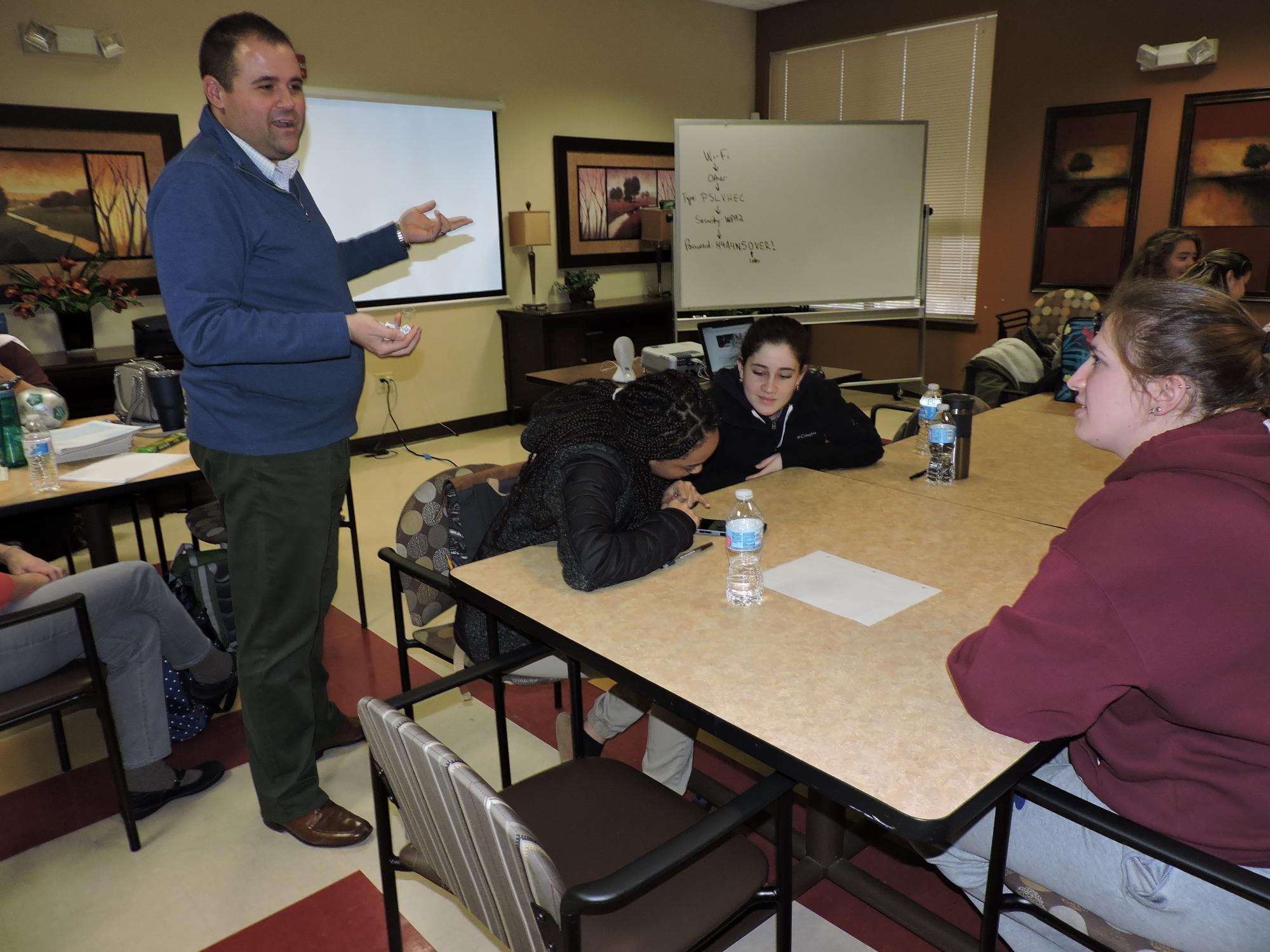 instructor talking to students