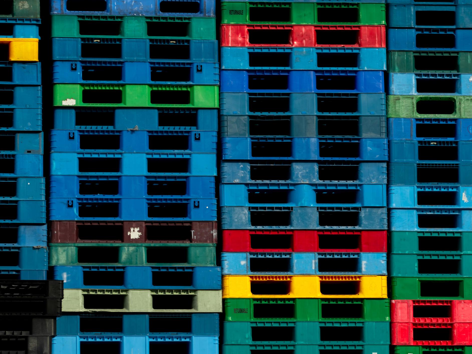 pile of molded plastic pallets