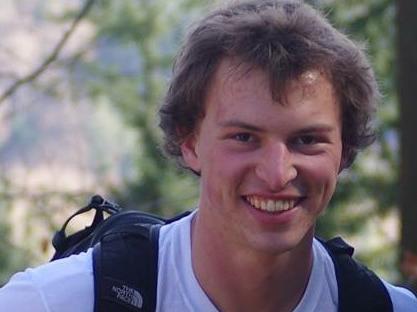 Jacob Cordell smiles during a hike