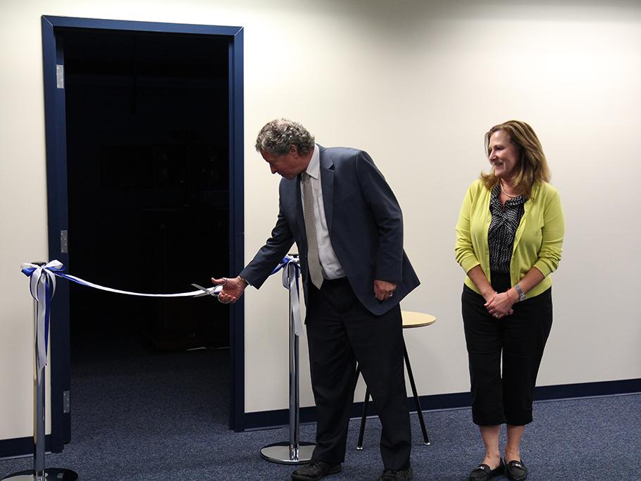 Photo of One Button studio ribbon cutting
