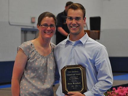 Ridley award student with award