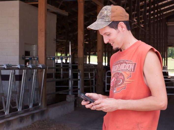 Rogers on his smartphone