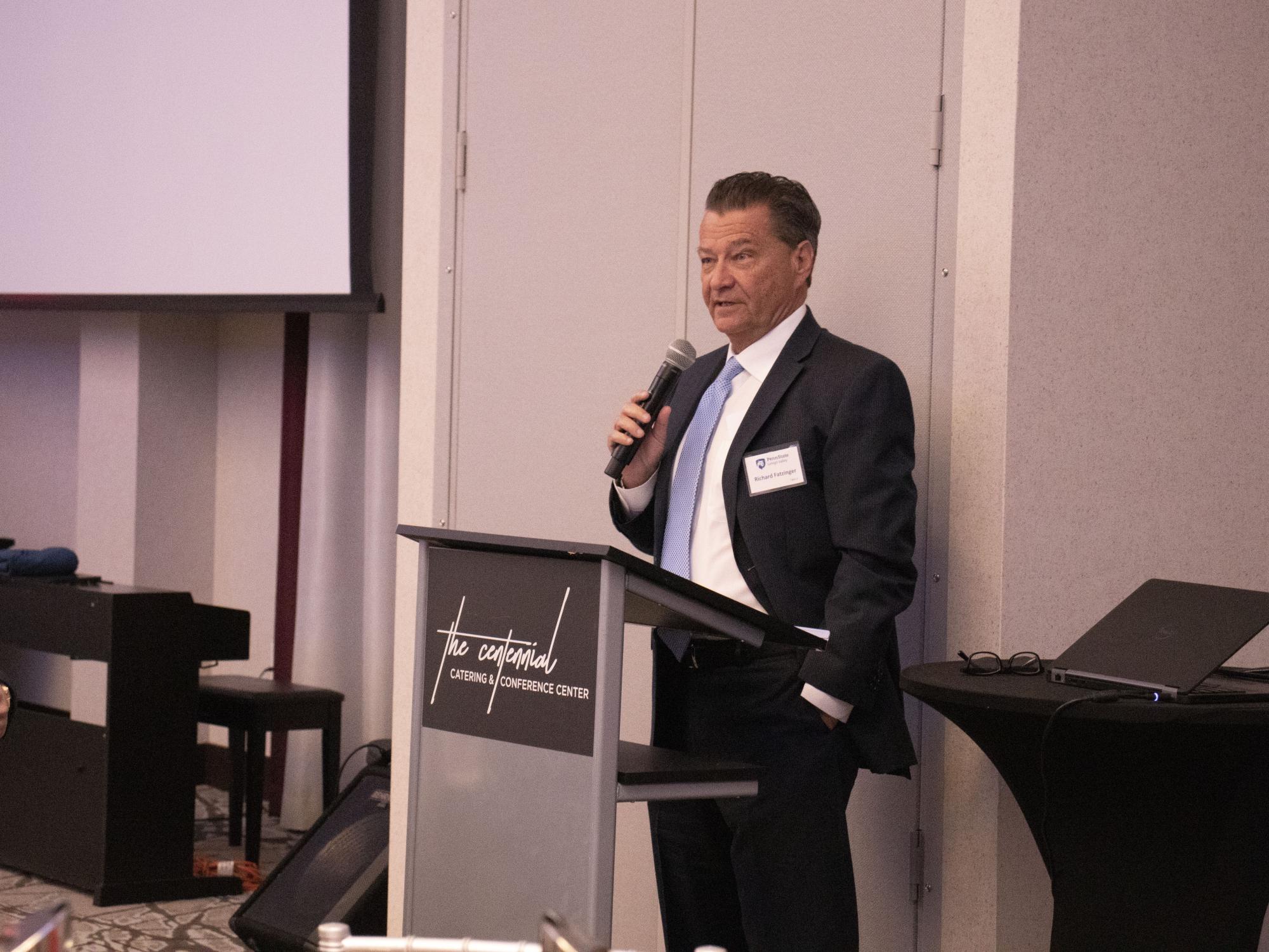 Man speaking at event