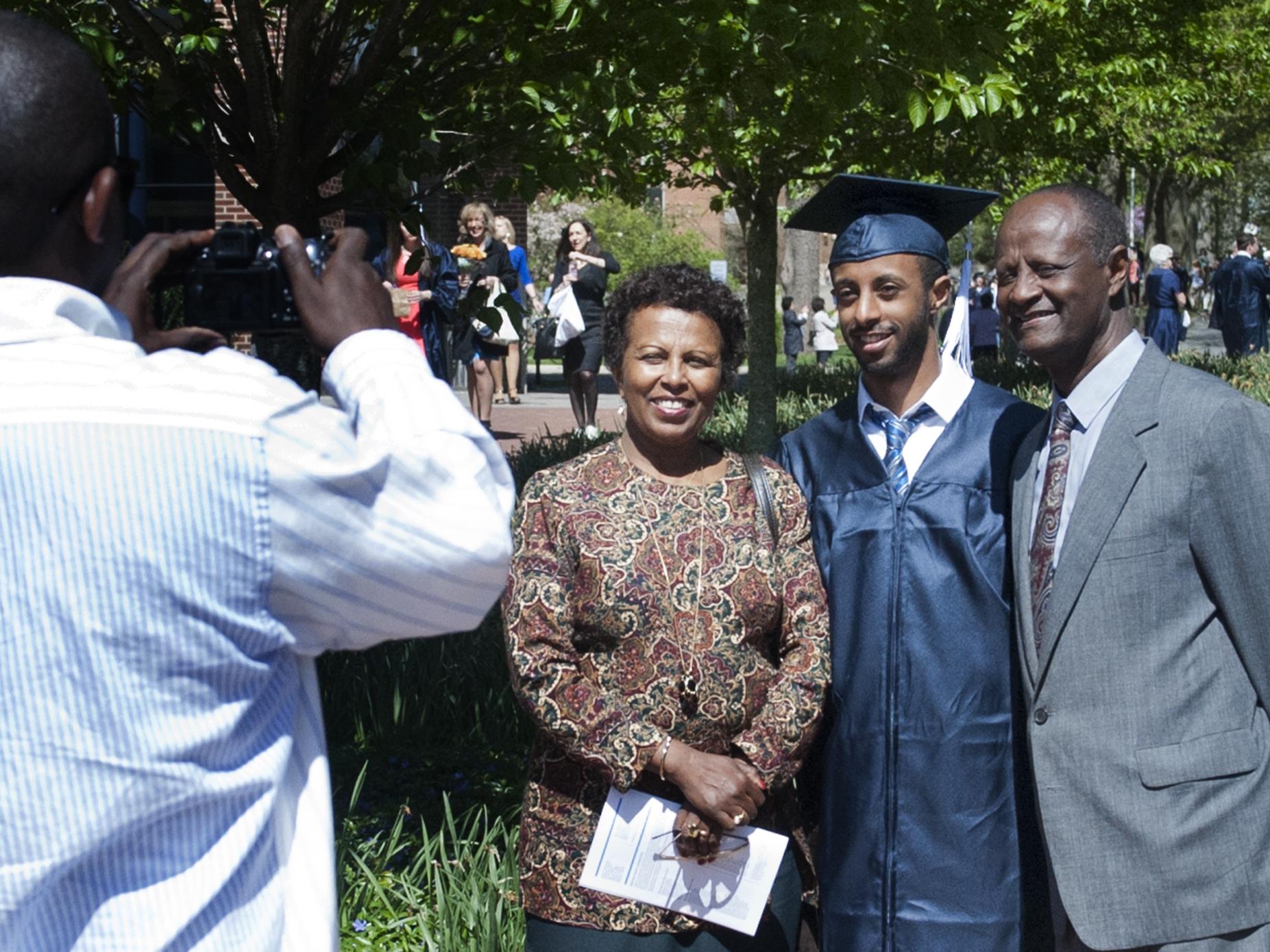 Penn State graduate with family
