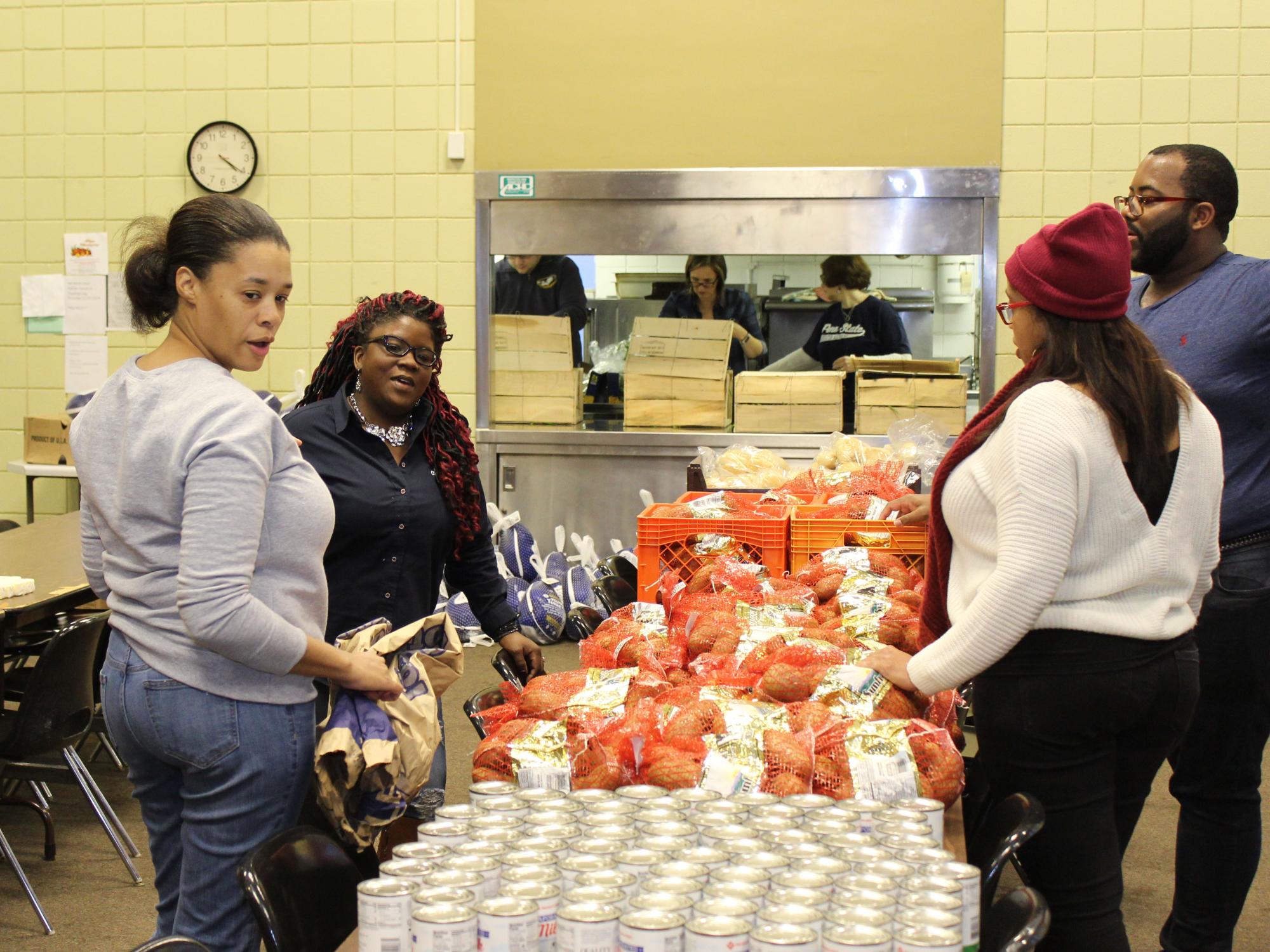 Greater Allegheny Street Team looks over donation numbers