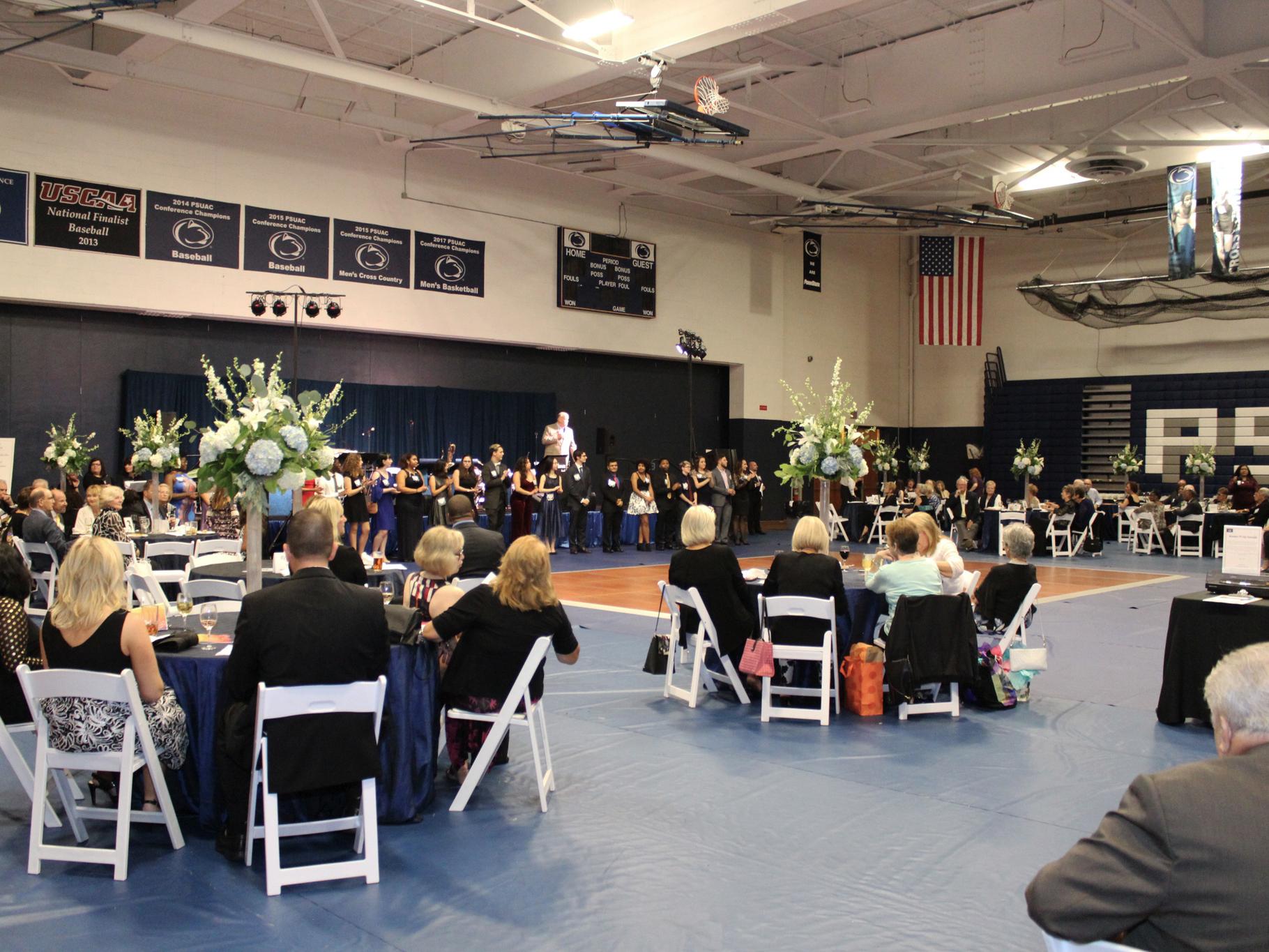 Tables with Guests around the Wunderley Gym 
