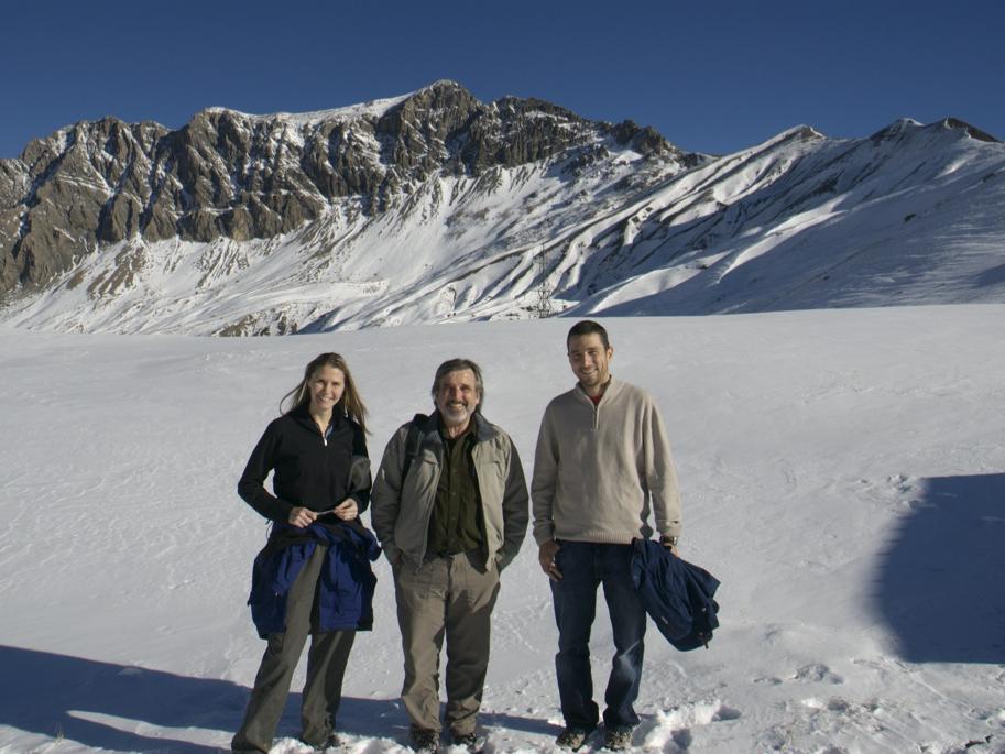 Duffy standing on a glacier with colleagues