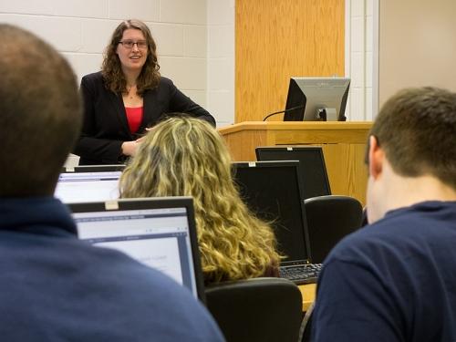 Professor teaching students in classroom