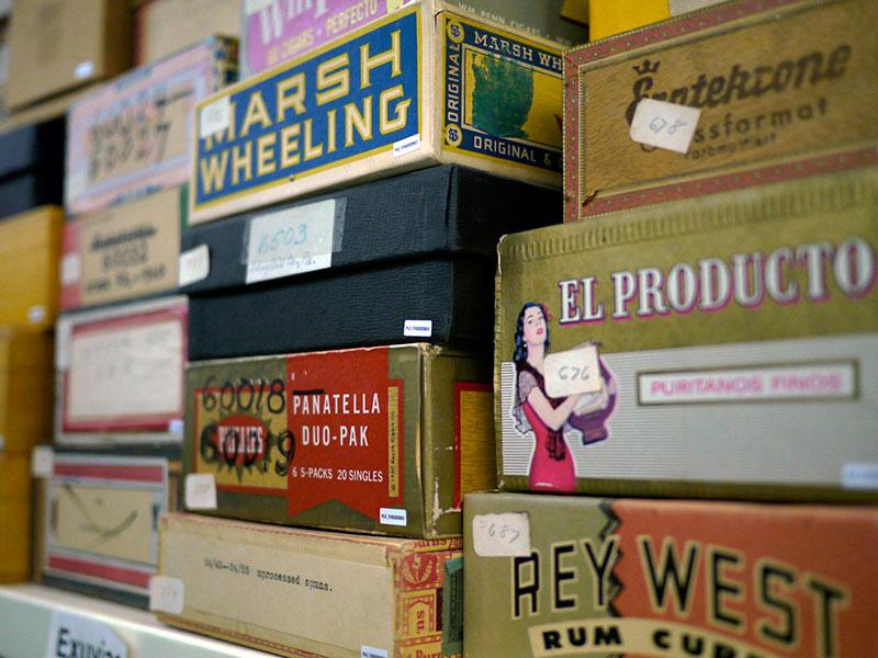 Stacks of vintage cigar boxes
