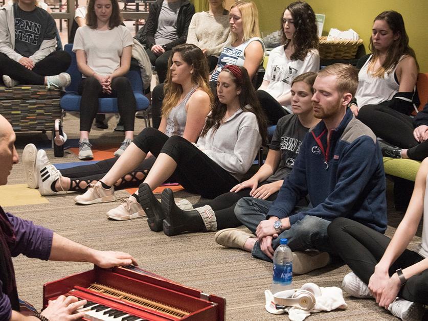 Mark Agrusti meditates with students