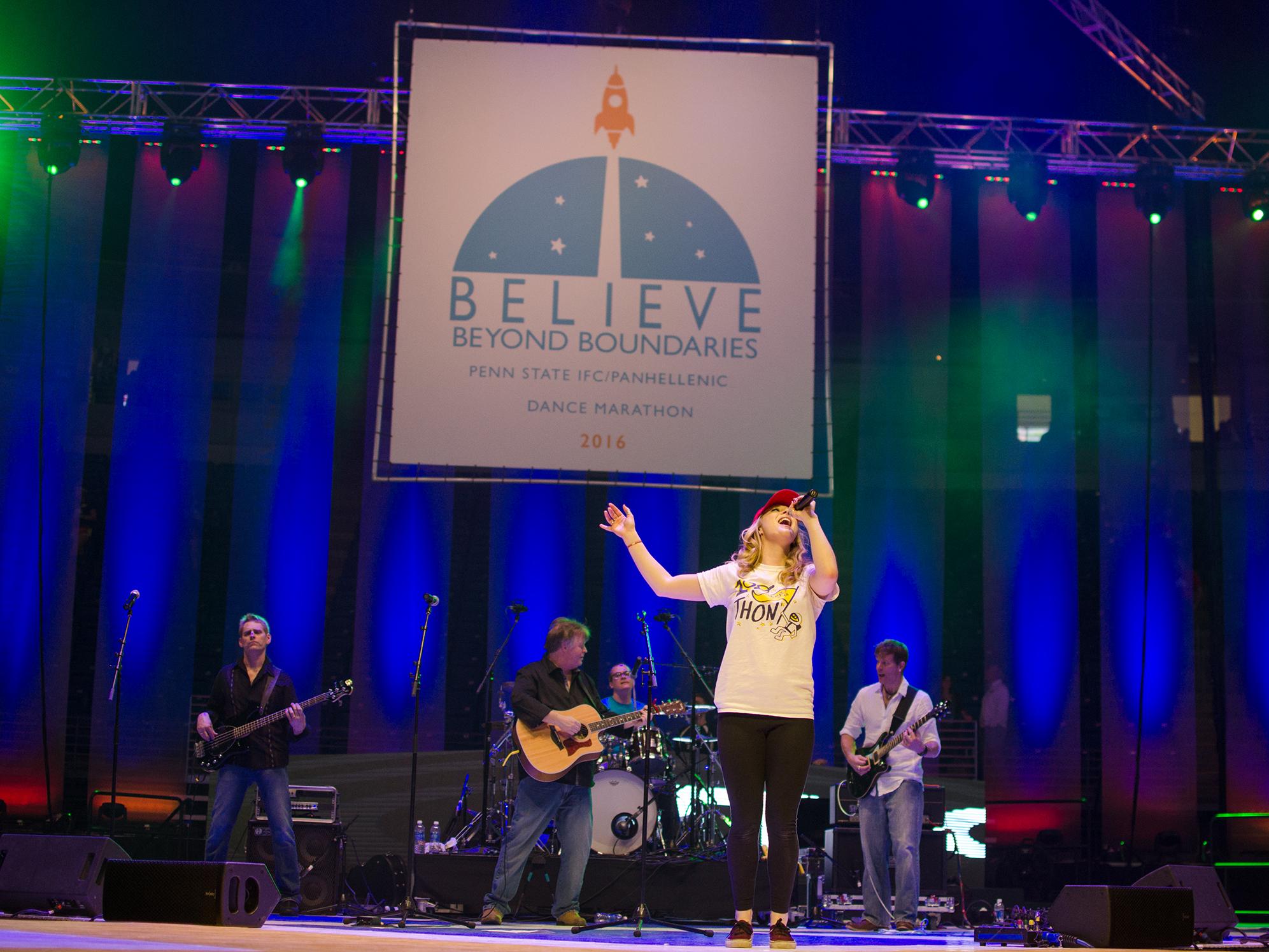 Band on stage playing at THON 2016