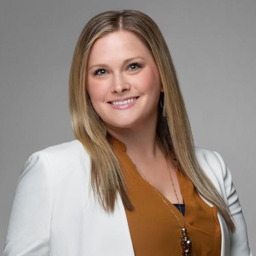 woman in white business suit