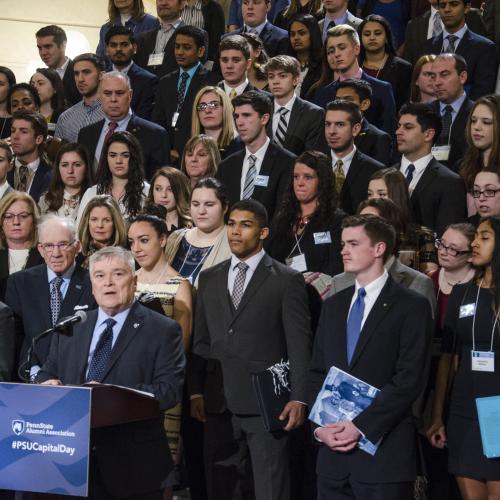 Barron with crowd behind him