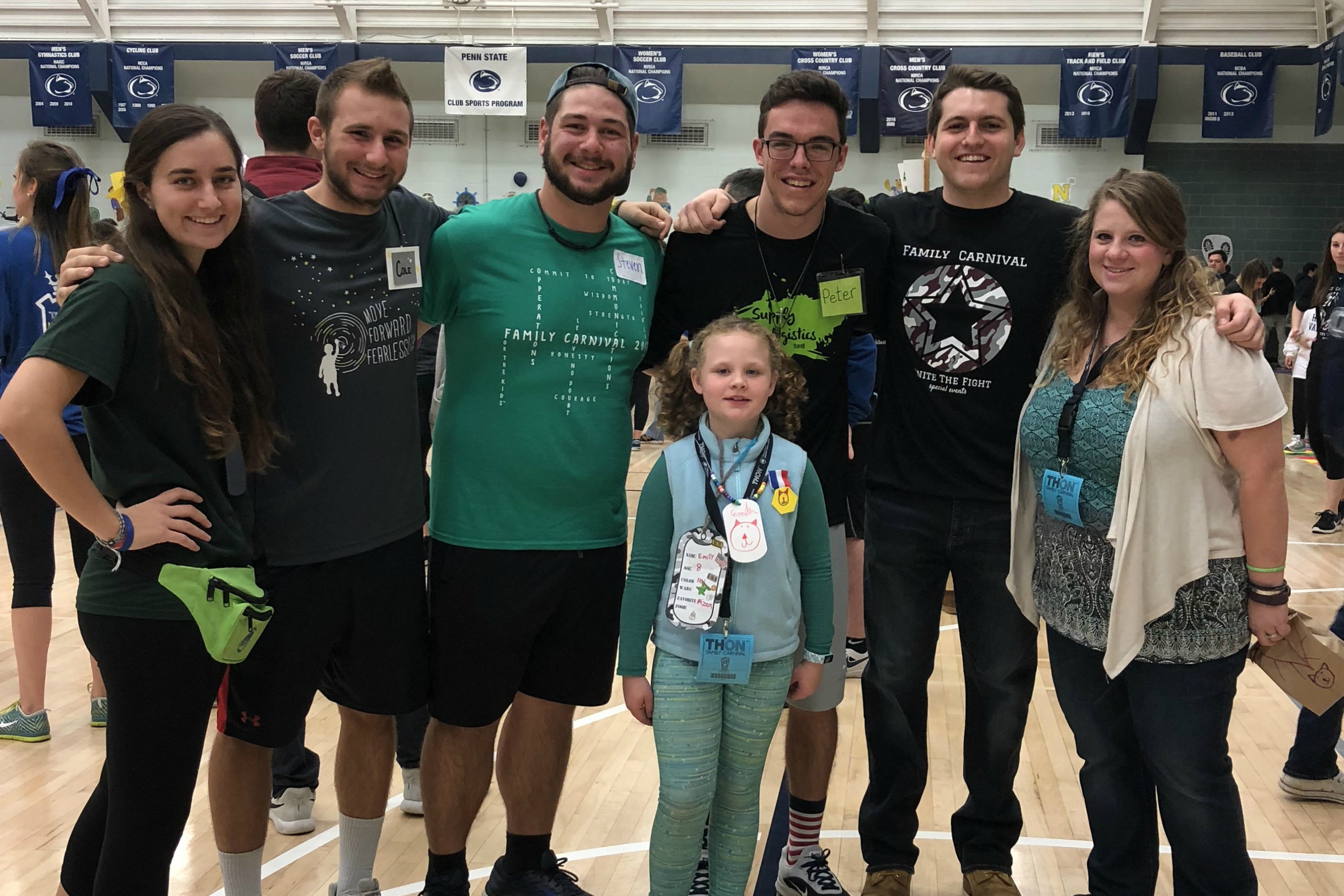 Friends and EMS THON members pose with the EMS THON Four Diamonds family at the THON Family Carnival held at the IM Building.